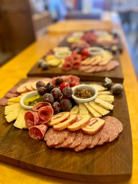 Close-up of charcuterie boards prepared for an elevated tasting experience at Adam Puchta Winery
